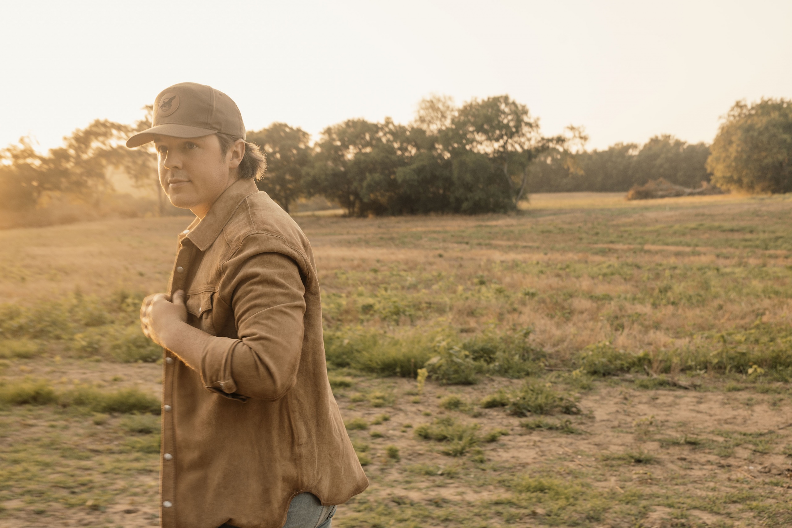 TRAVIS DENNING ANNOUNCES DEBUT ALBUM ROADS THAT GO NOWHERE COMING MAY 24th.